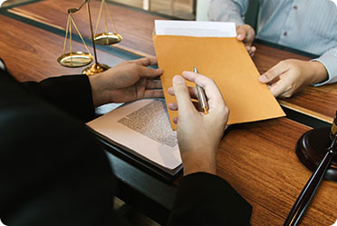 Lawyer is handing document to judge